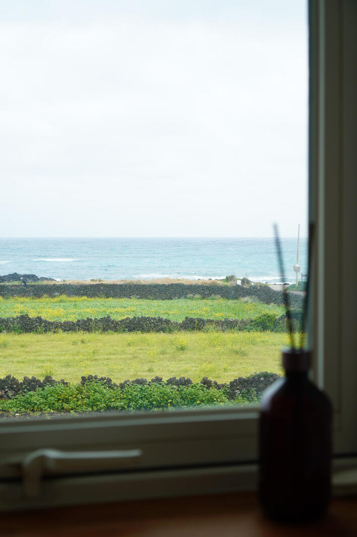 View of Jeju Beach through the Window
